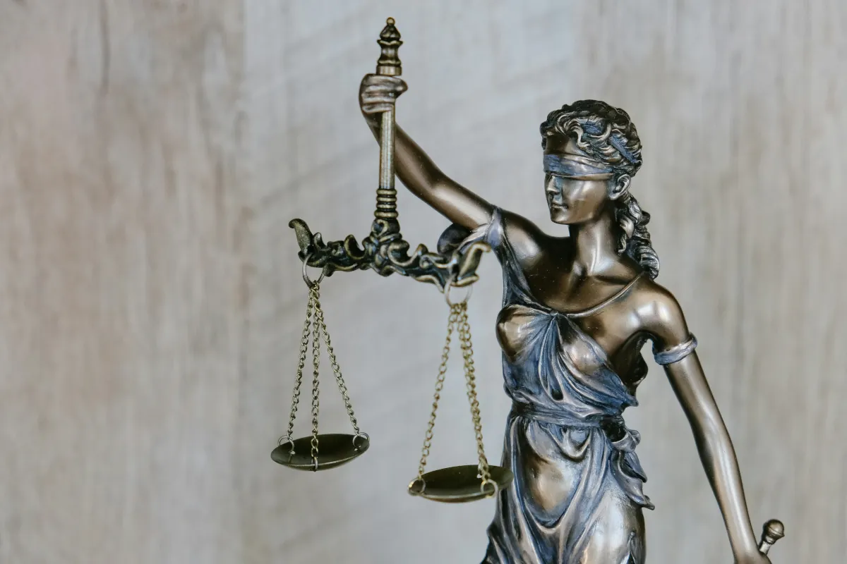 Justice is a blind equilibrium sustained by law